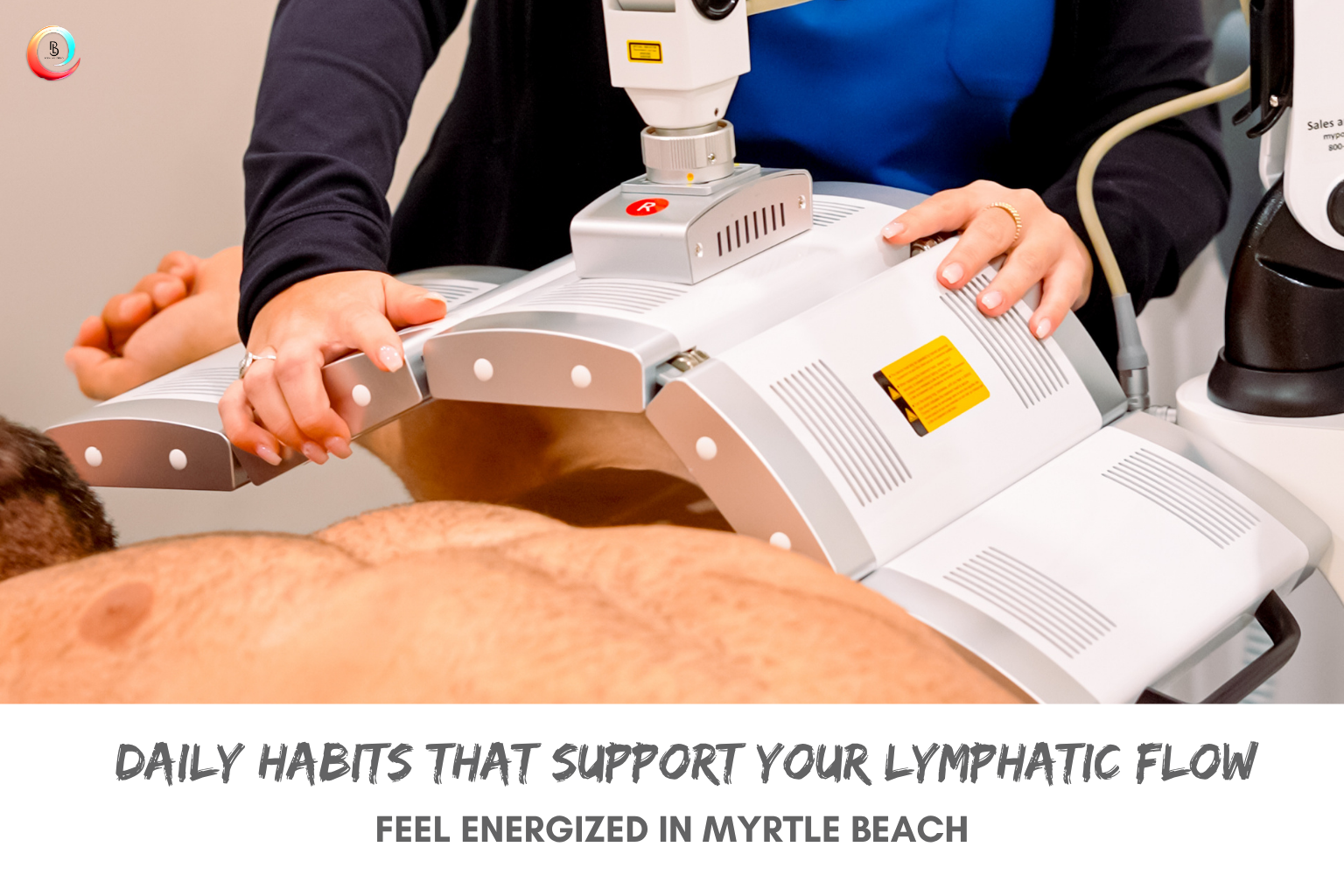 echnician positioning red light therapy device on client's back for lymphatic flow support at Body Lab Studios Myrtle Beach