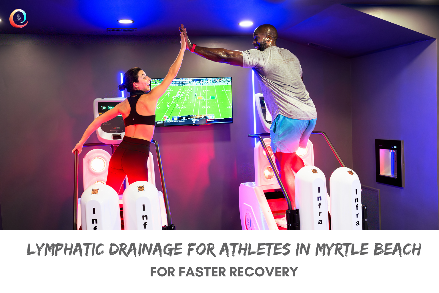 Two athlete clients high-fiving during infrared fitness and lymphatic drainage recovery session at Body Lab Studios Myrtle Beach